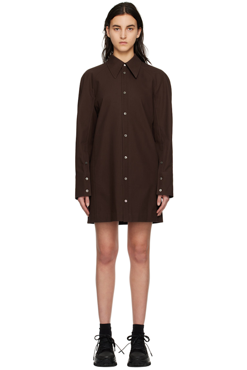 Cotton twill dress.

· Spread collar
· Button closure
· Seam pockets
· Raglan sleeves
· Single-button barrel cuffs
· Logo hardware at back collar
· Storm flap at back
· Unlined

Supplier color: Mud