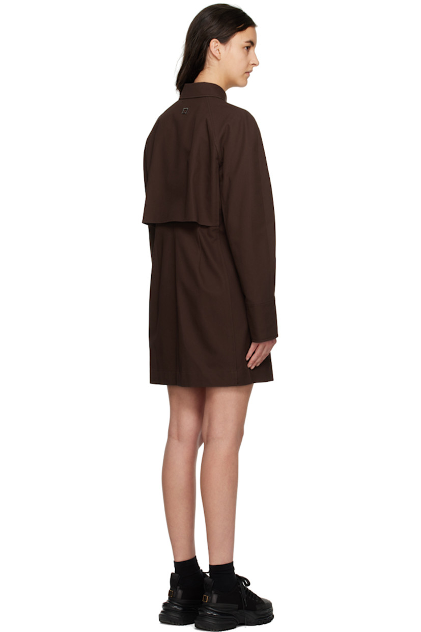 Cotton twill dress.

· Spread collar
· Button closure
· Seam pockets
· Raglan sleeves
· Single-button barrel cuffs
· Logo hardware at back collar
· Storm flap at back
· Unlined

Supplier color: Mud