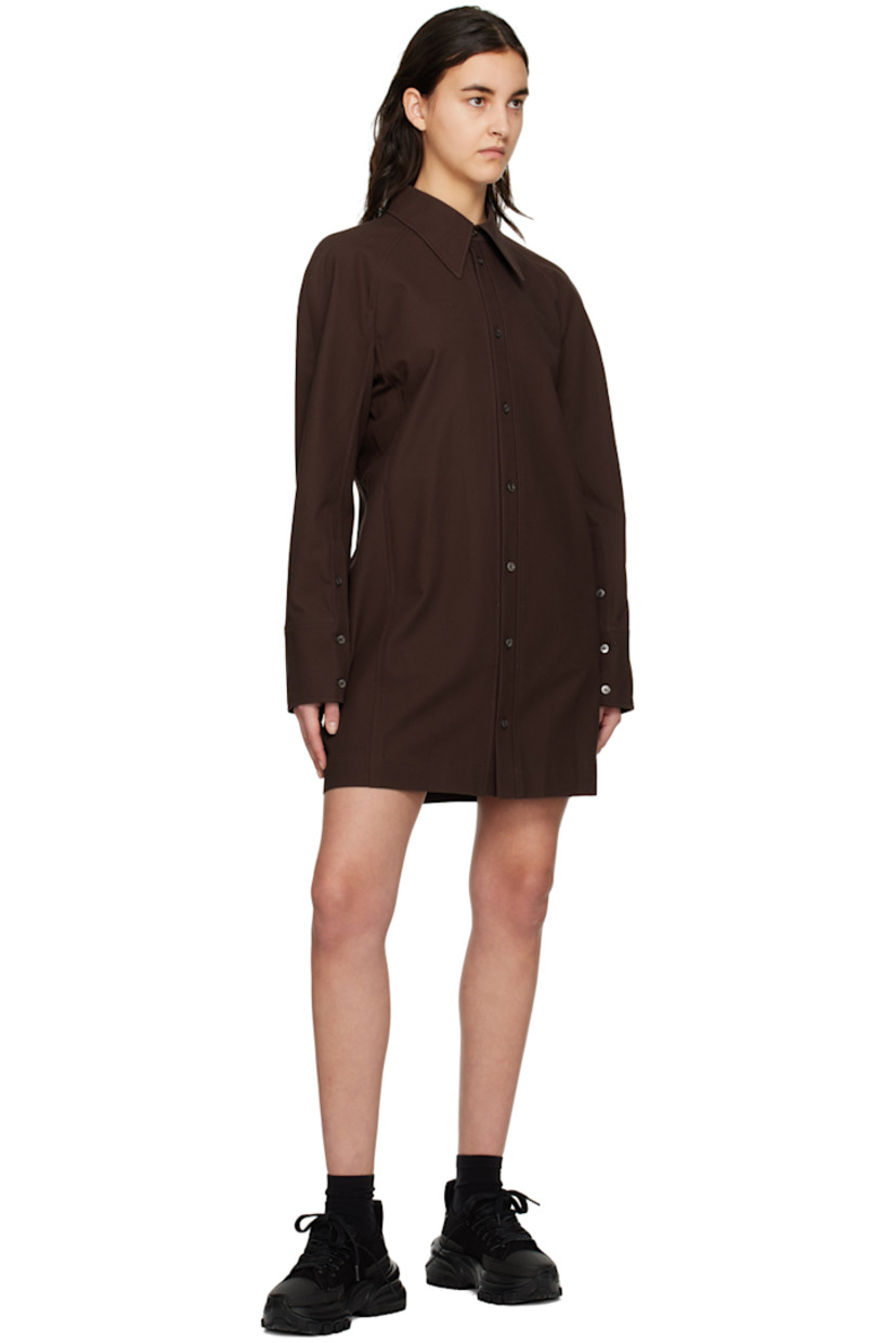 Cotton twill dress.

· Spread collar
· Button closure
· Seam pockets
· Raglan sleeves
· Single-button barrel cuffs
· Logo hardware at back collar
· Storm flap at back
· Unlined

Supplier color: Mud