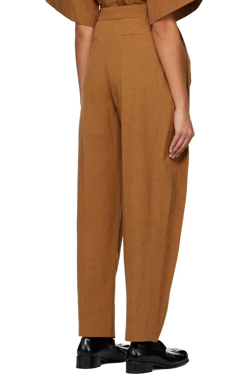 Cotton- and linen-blend poplin trousers.

· Belt loops and detachable logo charm at waistband
· Four-pocket styling
· Zip-fly
· Pleats at front
· Central creases at back

Supplier color: Camel