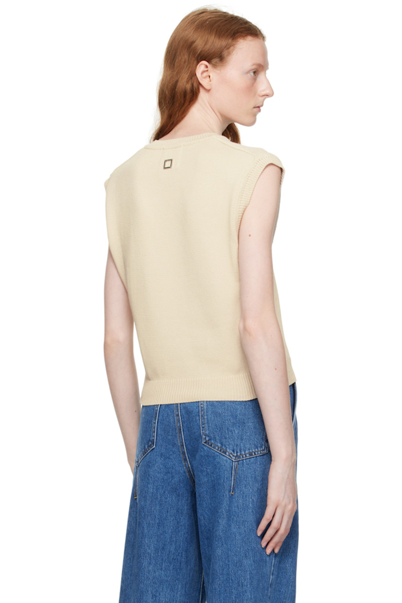 Knit cotton-blend vest.

· Rib knit V-neck, cropped hem, and armscyes
· Logo hardware at back collar 

Supplier color: Beige