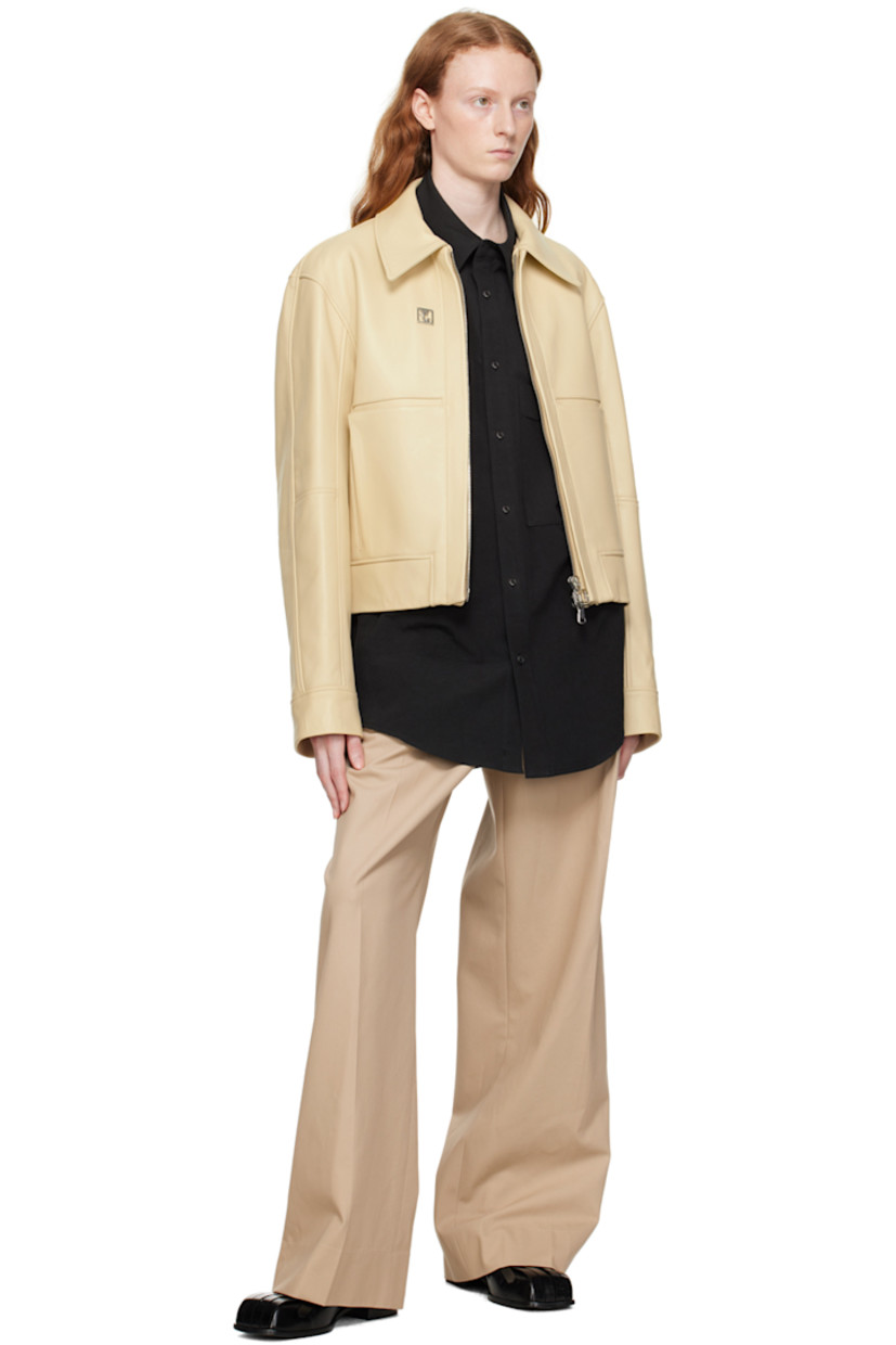 Cotton- and linen- blend broadcloth shirt. 

· Spread collar 
· Button closure 
· Logo embroidered at patch pocket
· Modified shirttail hem
· Button vent at side seams 
· Single-button barrel cuffs 
· Logo hardware at back collar 
· Pleats at back yoke 
· Logo-engraved silver-tone hardware

Supplier color: Black