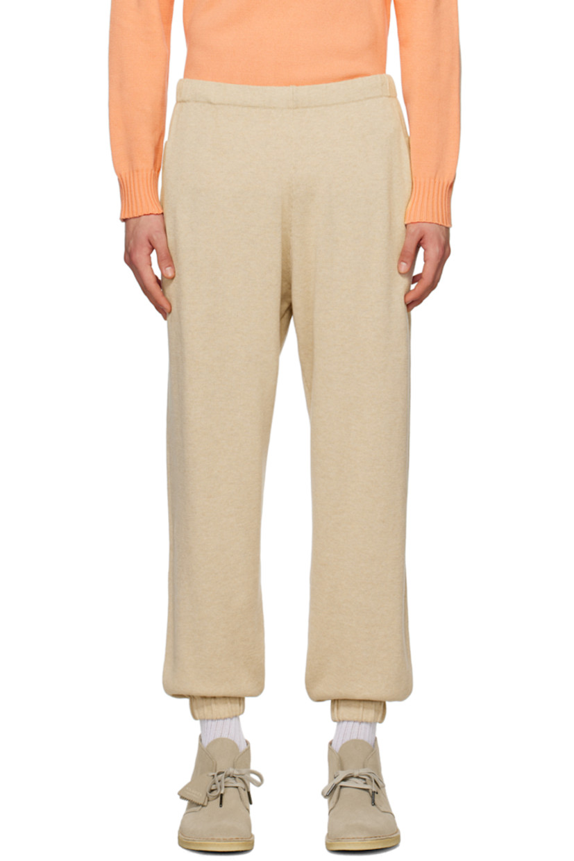 Tapered knit cotton sweatpants. 

· Concealed drawstring at elasticized waistband
· Two-pocket styling
�· Elasticized cuffs

Supplier color: Vanilla