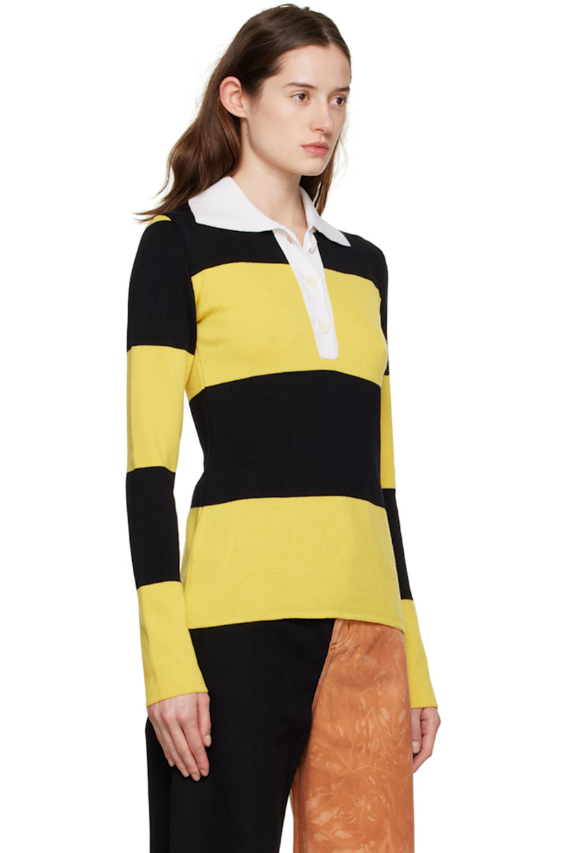Knit merino wool polo. Stripes throughout.

· Rib knit spread collar
· Three-button placket

Supplier color: Yellow/Black