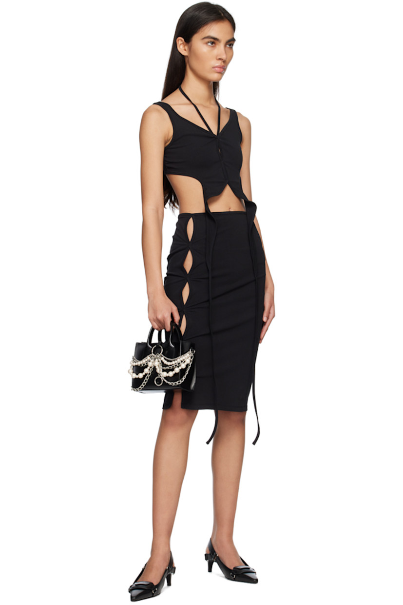 Stretch cotton- and nylon-blend jersey skirt.

· Central seam at front and back 
· Cutouts at front
· Concealed zip closure at side seam

Supplier color: Black