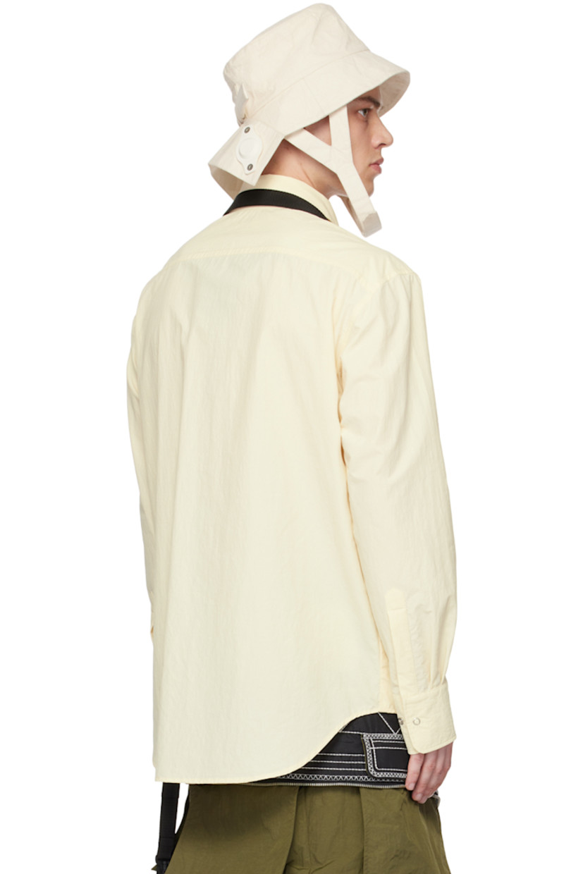 Packable crinkled nylon- and cotton-blend taffeta shirt. 

· Press-stud tab at spread collar
· Zip closure
· Zip pockets
· Detachable webbing strap at front and back 
· Shirttail hem
· Press-stud fastening at cuffs

Supplier color: Cream
