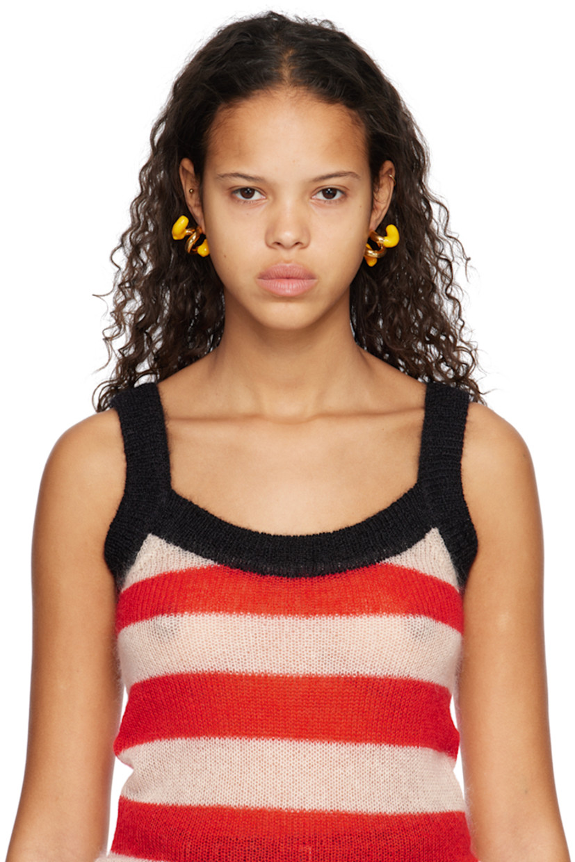 Pair of drop earrings in gold-tone brass. Twisted detailing throughout.

· Hand-rubberized accent in yellow at length
· Logo etched at side
· Post-stud fastening 
· H1.5" x W1"

Supplier color: Gold/Apricot
