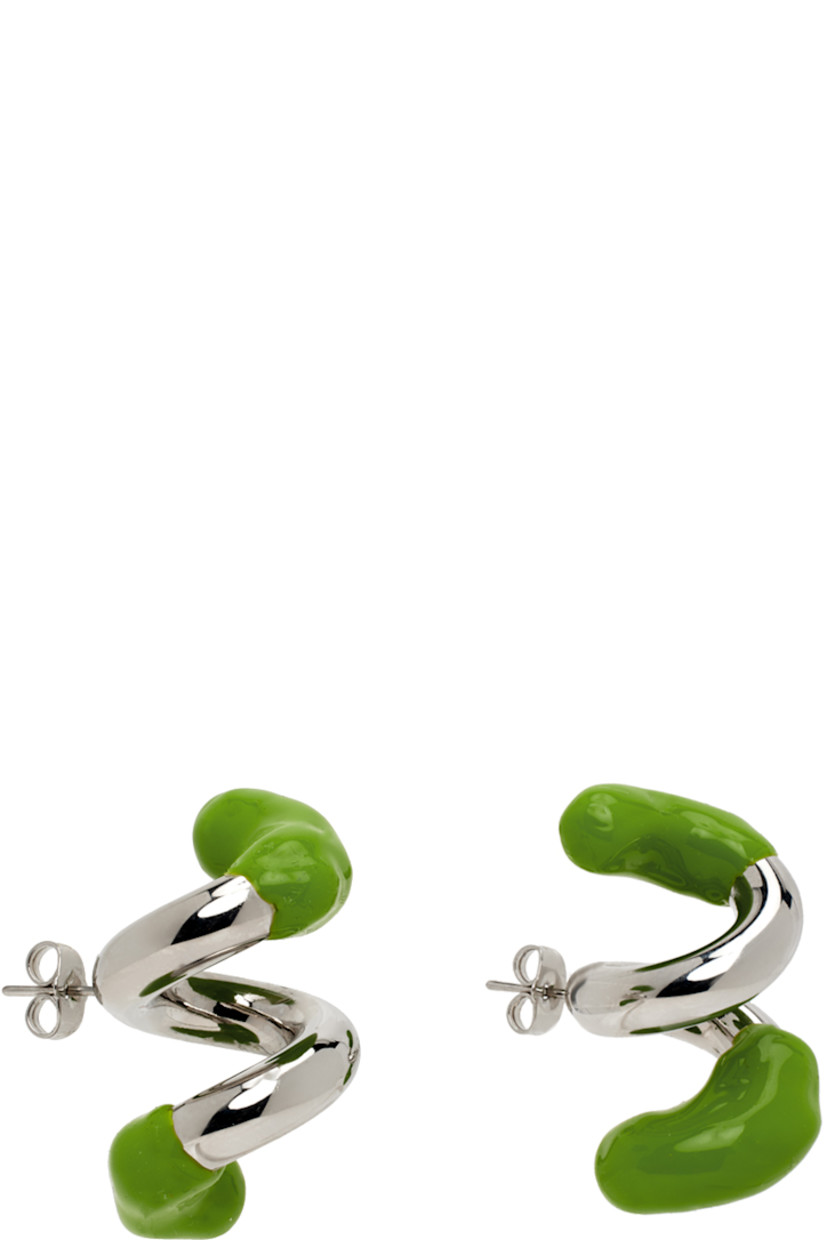 Pair of drop earrings in silver-tone brass. Twisted detailing throughout.

· Hand-rubberized accent in green at length
· Logo etched at side
· Post-stud fastening 
· H1.5" x W1"

Supplier color: Silver/Fern green