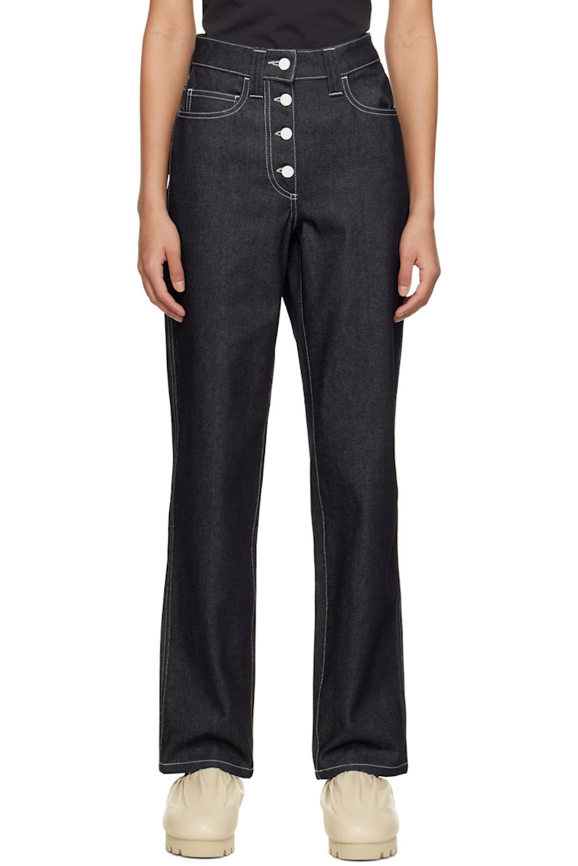 Non-stretch denim jeans.

· Belt loops
· Five-pocket styling
· Button-fly
· Rubberized logo patch at back waistband
· Logo-engraved white hardware
· Contrast stitching in white

Supplier color: Dark denim