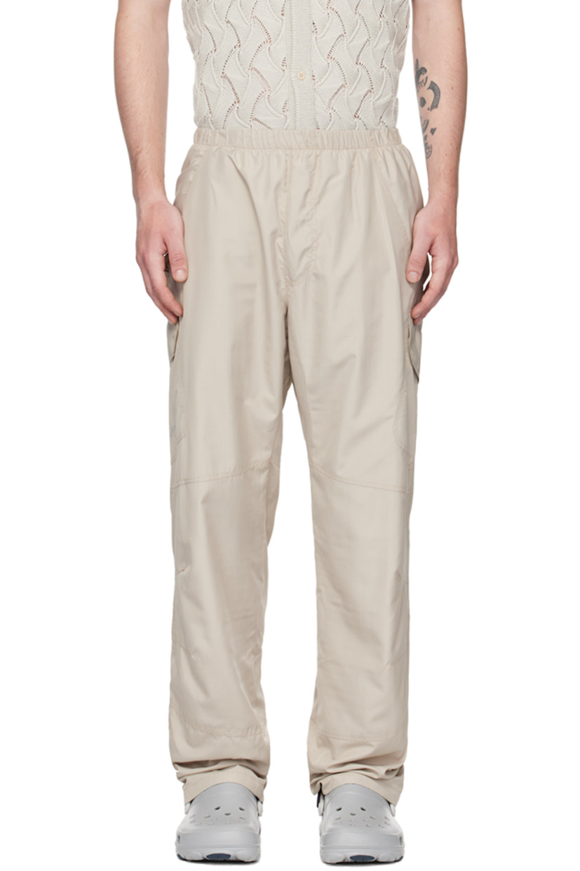 Relaxed-fit recycled polyester ripstop cargo pants. 

· Elasticized waistband 
· Two-pocket styling 
· Mock-fly 
· Darts at knees 
· Logo embroidered at outseam 
· Cargo pocket at outseams 
· Full mesh lining 

Supplier color: Grey