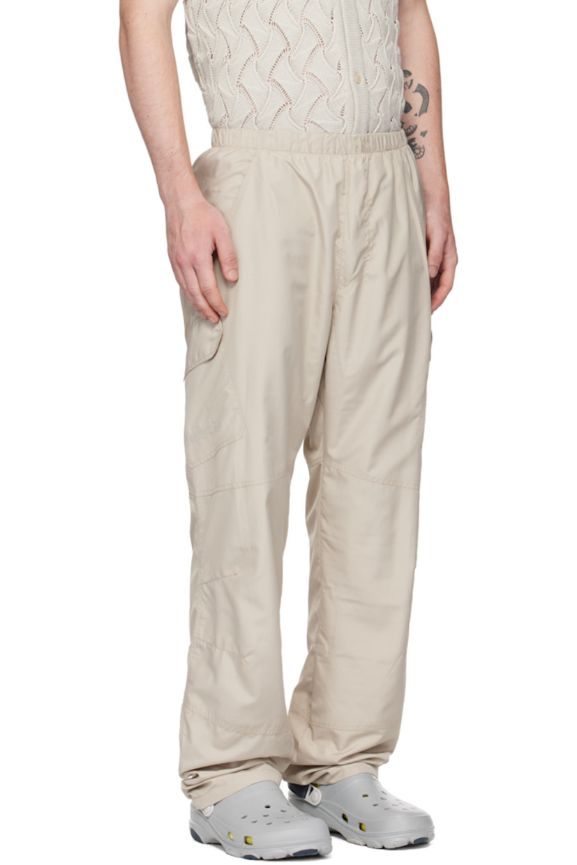 Relaxed-fit recycled polyester ripstop cargo pants. 

· Elasticized waistband 
· Two-pocket styling 
· Mock-fly 
· Darts at knees 
· Logo embroidered at outseam 
· Cargo pocket at outseams 
· Full mesh lining 

Supplier color: Grey