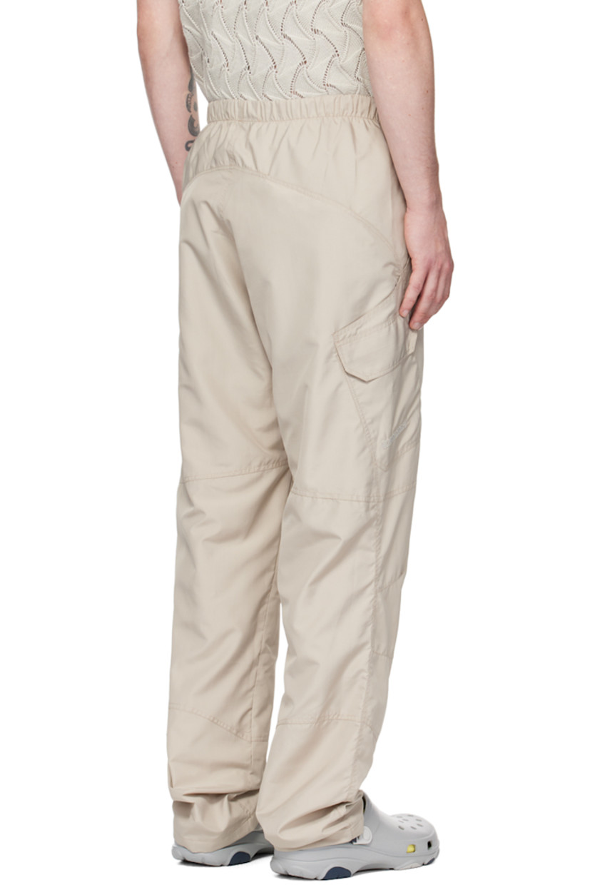Relaxed-fit recycled polyester ripstop cargo pants. 

· Elasticized waistband 
· Two-pocket styling 
· Mock-fly 
· Darts at knees 
· Logo embroidered at outseam 
· Cargo pocket at outseams 
· Full mesh lining 

Supplier color: Grey