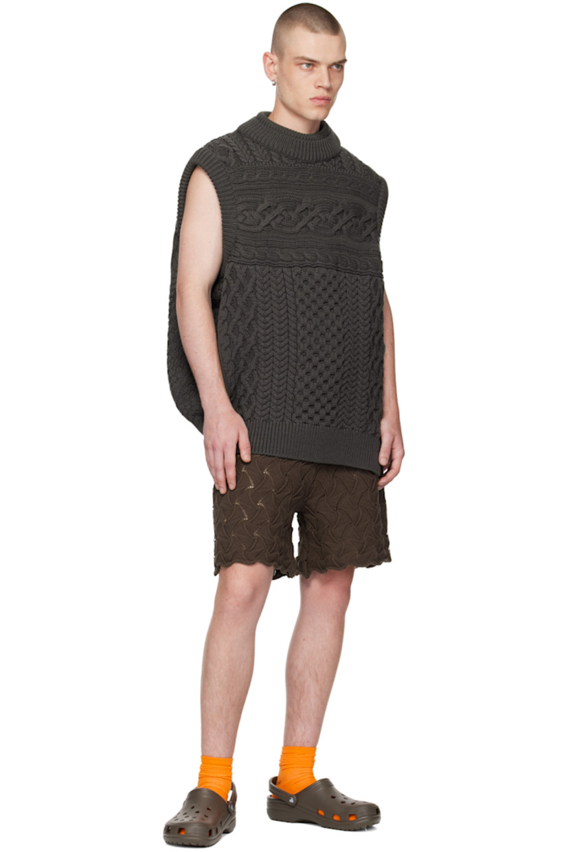 Textured knit cotton shorts. Jacquard graphic pattern throughout. 

· Bungee-style drawstring at elasticized waistband 
· Rolled cuffs 

Supplier color: Brown