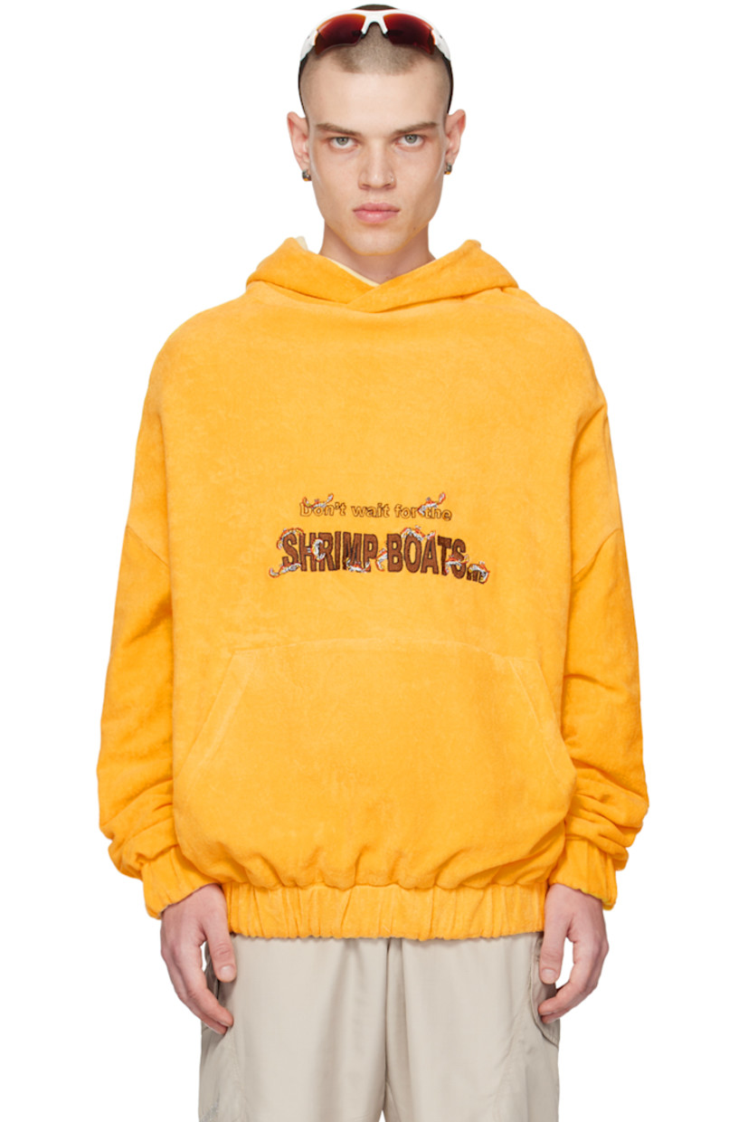 Reverse French terry hoodie. 

Reverse in yellow cotton jersey. 

· Text and graphic embroidered at front and back
· Kangaroo pocket 
· Elasticized hem and cuffs 
· Dropped shoulders 
· Kangaroo pocket at interior 

Supplier color: Yellow