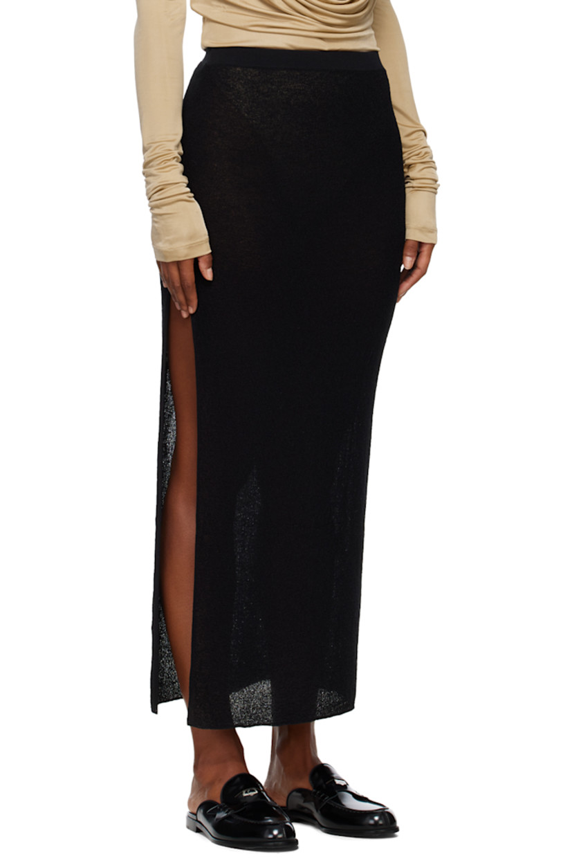 Semi-sheer cotton and nylon-blend crepe skirt. 

· High-rise
· Elasticized waistband 
· Vented hem 

Supplier color: Black
