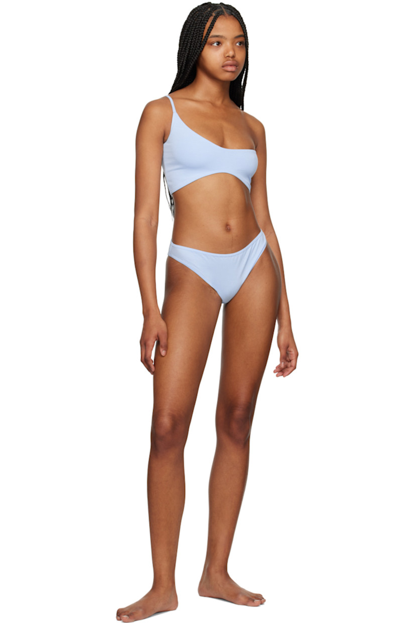 Stretch organic cotton jersey bra. 

· Single-shoulder construction
· Asymmetric neck and hem
· Fixed shoulder strap
· Fully lined

Stretch organic cotton jersey briefs.

· Elasticized waistband
· Partially lined

Supplier color: Sky