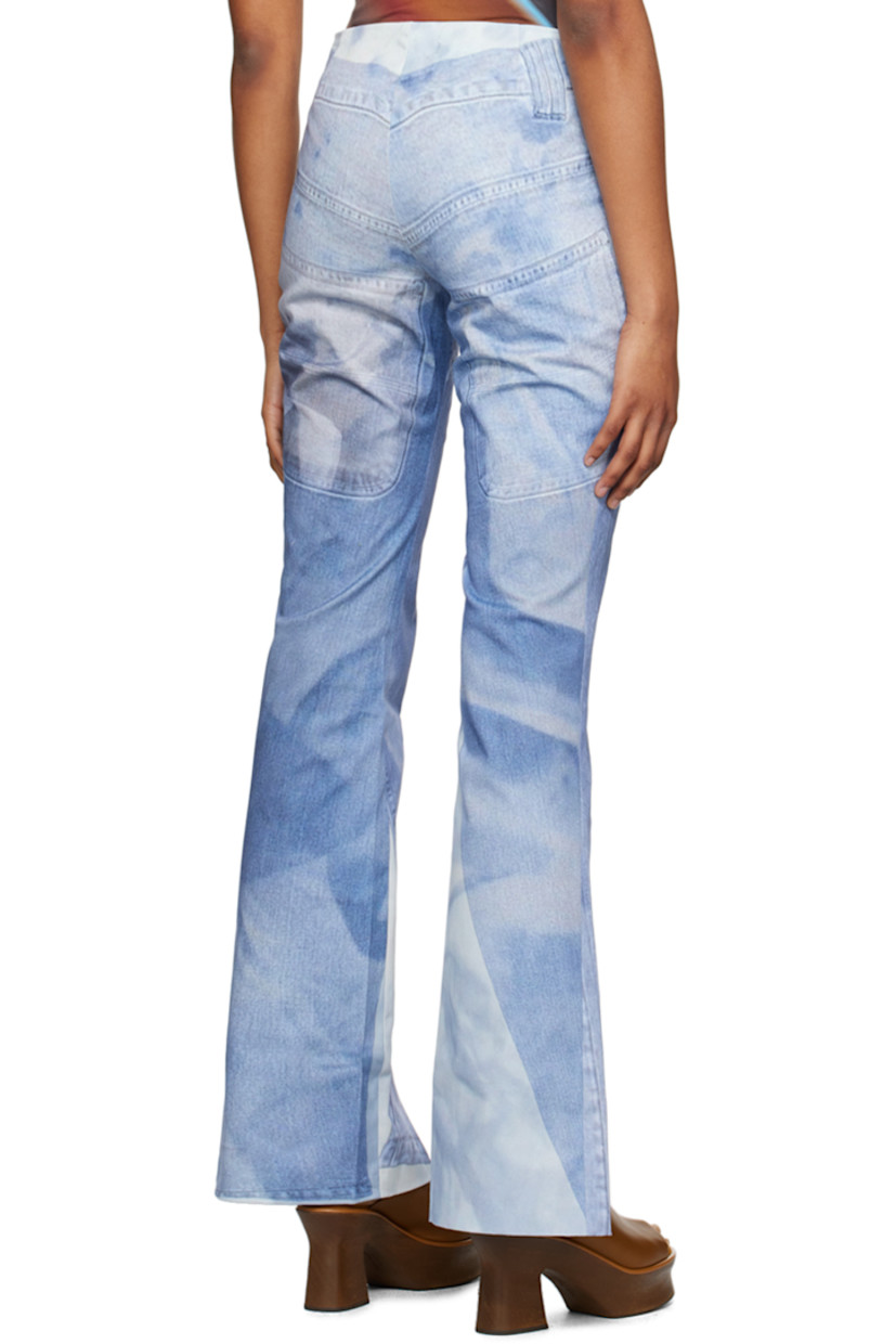 Stretch organic cotton-blend denim jeans. Graphic printed throughout. 

· Vented cuffs
· Concealed zip closure at outseam 

Supplier color: Print multi