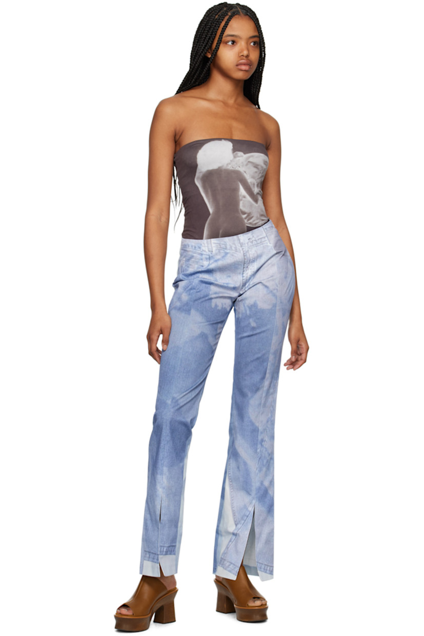 Stretch organic cotton-blend denim jeans. Graphic printed throughout. 

· Vented cuffs
· Concealed zip closure at outseam 

Supplier color: Print multi