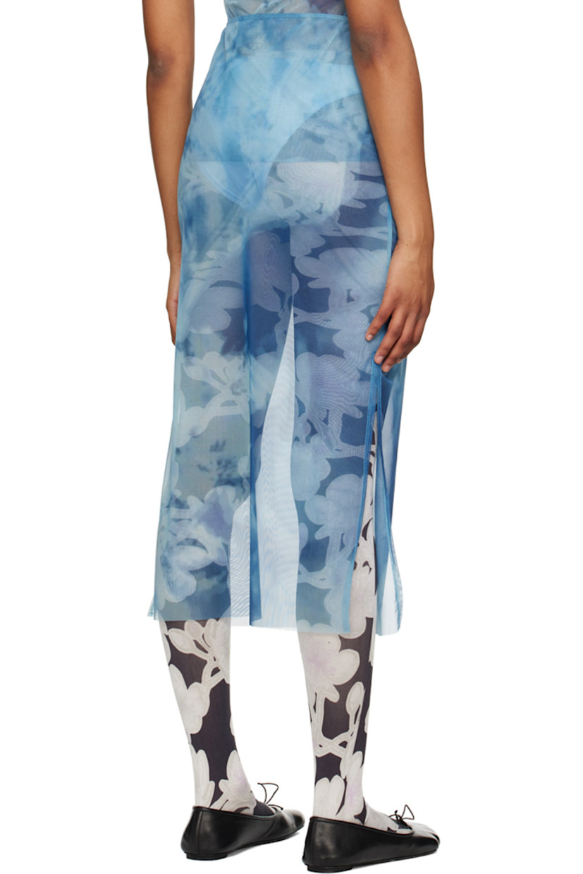 Lightweight semi-sheer stretch recycled polyester mesh skirt. Graphic and text printed throughout. 

· Elasticized waistband
· Vented side seam

Supplier color: Print multi
