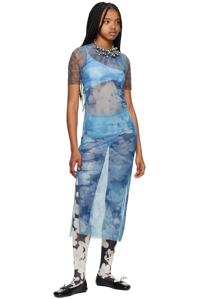 Semi-sheer stretch recycled polyester mesh T-shirt. Graphic pattern printed throughout. 

· Crewneck
· Text printed at front

Supplier color: Print multi