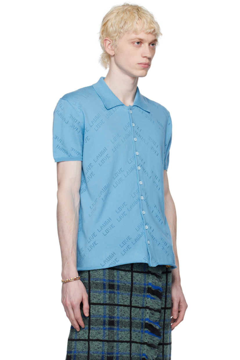 Cotton jersey shirt. Text perforated throughout.

· Spread collar
· Button closure
· Rib knit cuffs
· Rolled edge at hem

Supplier color: Youwie jersey fiordo
