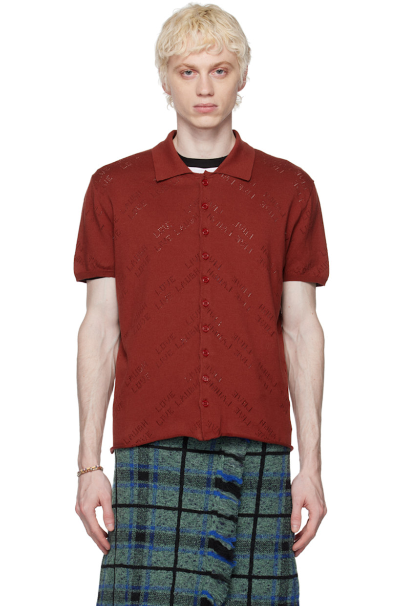 Cotton jersey shirt. Text perforated throughout.

· Spread collar
· Button closure
· Rolled edge at hem
· Rib knit cuffs

Supplier color: Youwie jersey porto