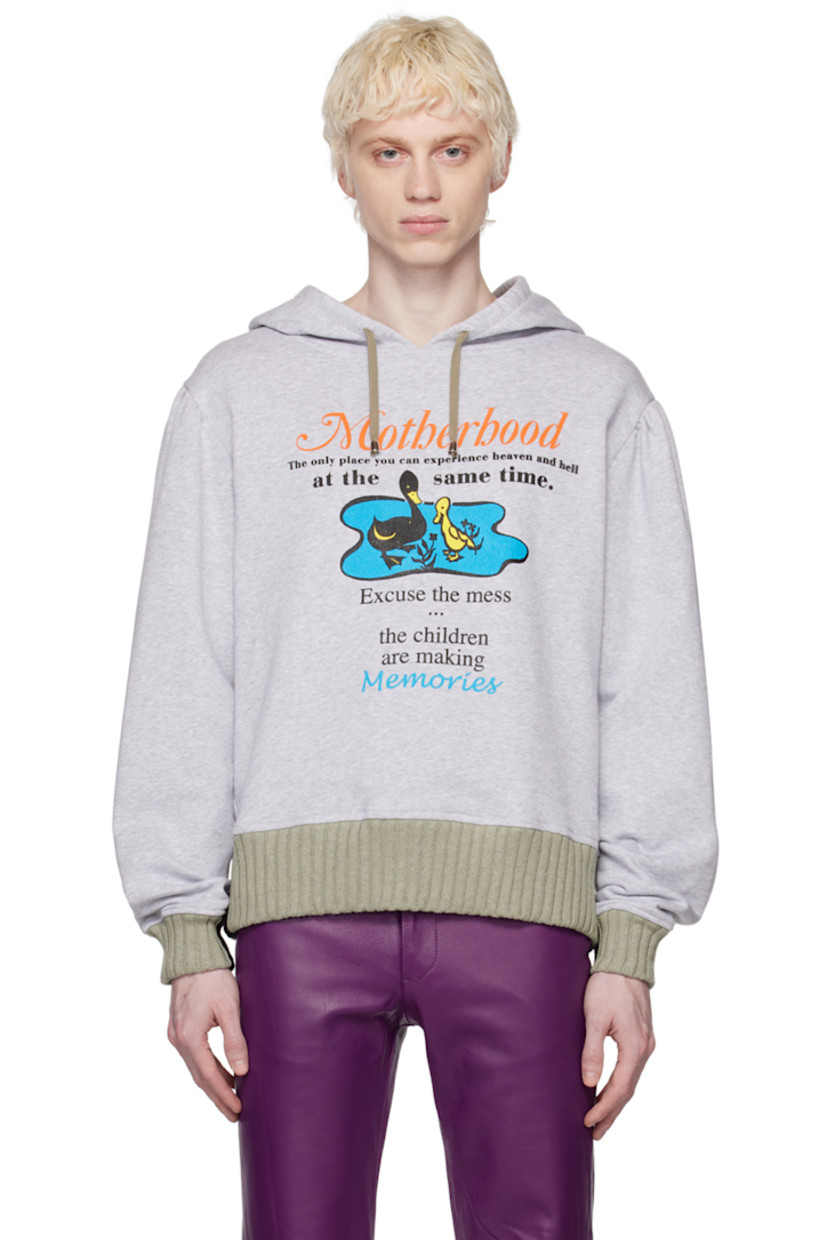 Cotton jersey hoodie.

· Drawstring at hood
· Text and graphic screen-printed at front
· Rib knit hem and cuffs
· Puff sleeves
· Text screen-printed at back

Available exclusively at SSENSE.

Supplier color: Grey