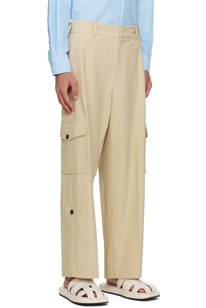Cotton canvas cargo pants. 

· Belt loops
· Three-pocket styling
· Zip-fly 
· Central crease at front 
· Cargo pockets at outseams
· Corozo hardware

Supplier color: Light beige