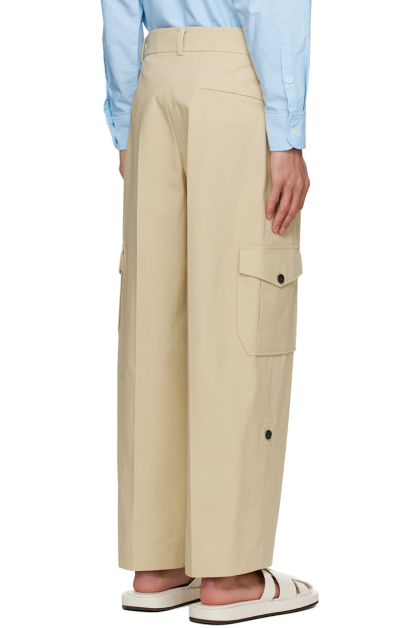 Cotton canvas cargo pants. 

· Belt loops
· Three-pocket styling
· Zip-fly 
· Central crease at front 
· Cargo pockets at outseams
· Corozo hardware

Supplier color: Light beige