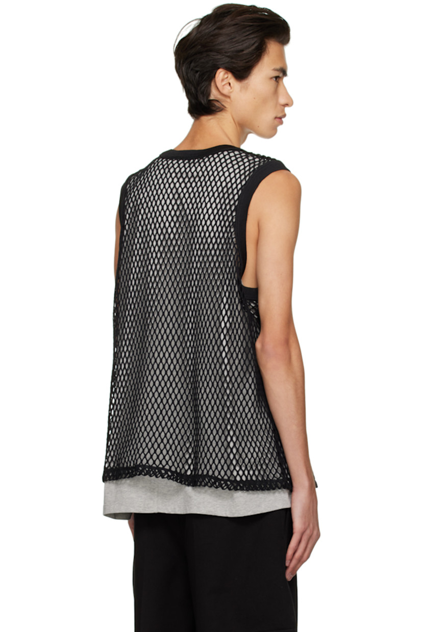 Cotton fishnet tank top. 

· Rib knit crewneck and armscyes
· Logo hardware at chest
· Racer back

Cotton jersey tank top. Flatlock stitching at racer back.

Supplier color: Black