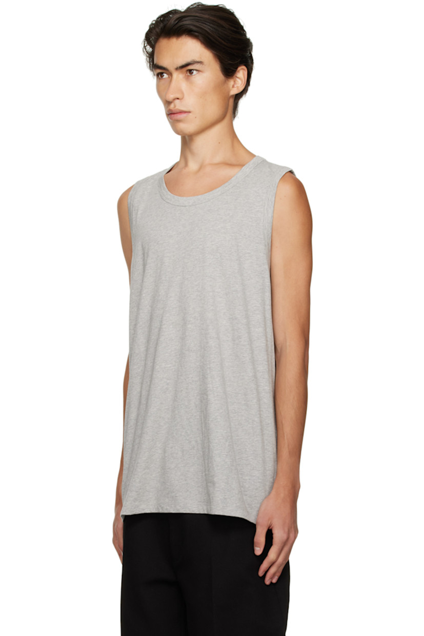 Cotton fishnet tank top. 

· Rib knit crewneck and armscyes
· Logo hardware at chest
· Racer back

Cotton jersey tank top. Flatlock stitching at racer back.

Supplier color: Black