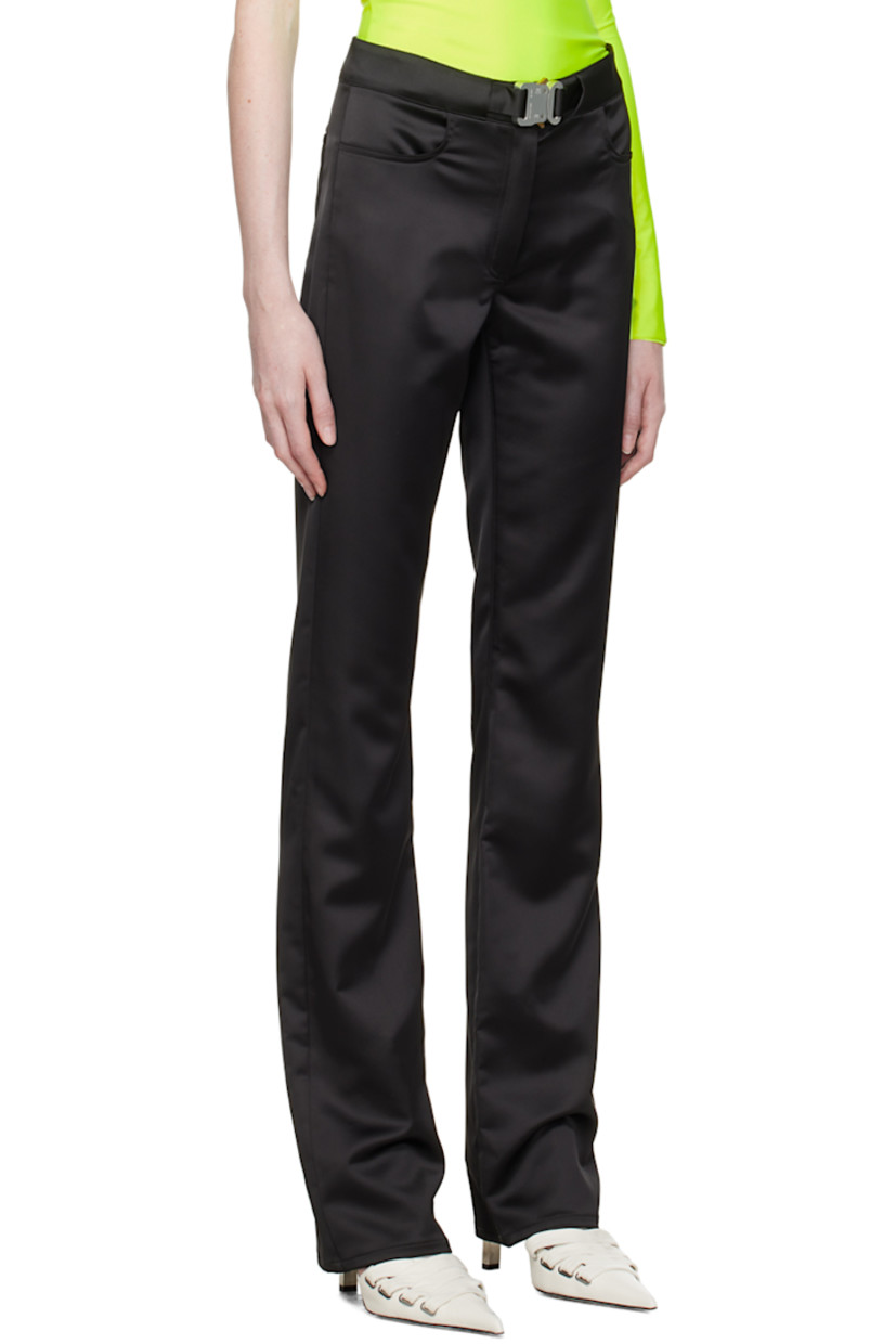 Stretch polyester satin trousers. 

· Integrated press-release belt 
· Four-pocket styling 
· Zip-fly 
· Logo-engraved silver-tone hardware 

Supplier color: Black