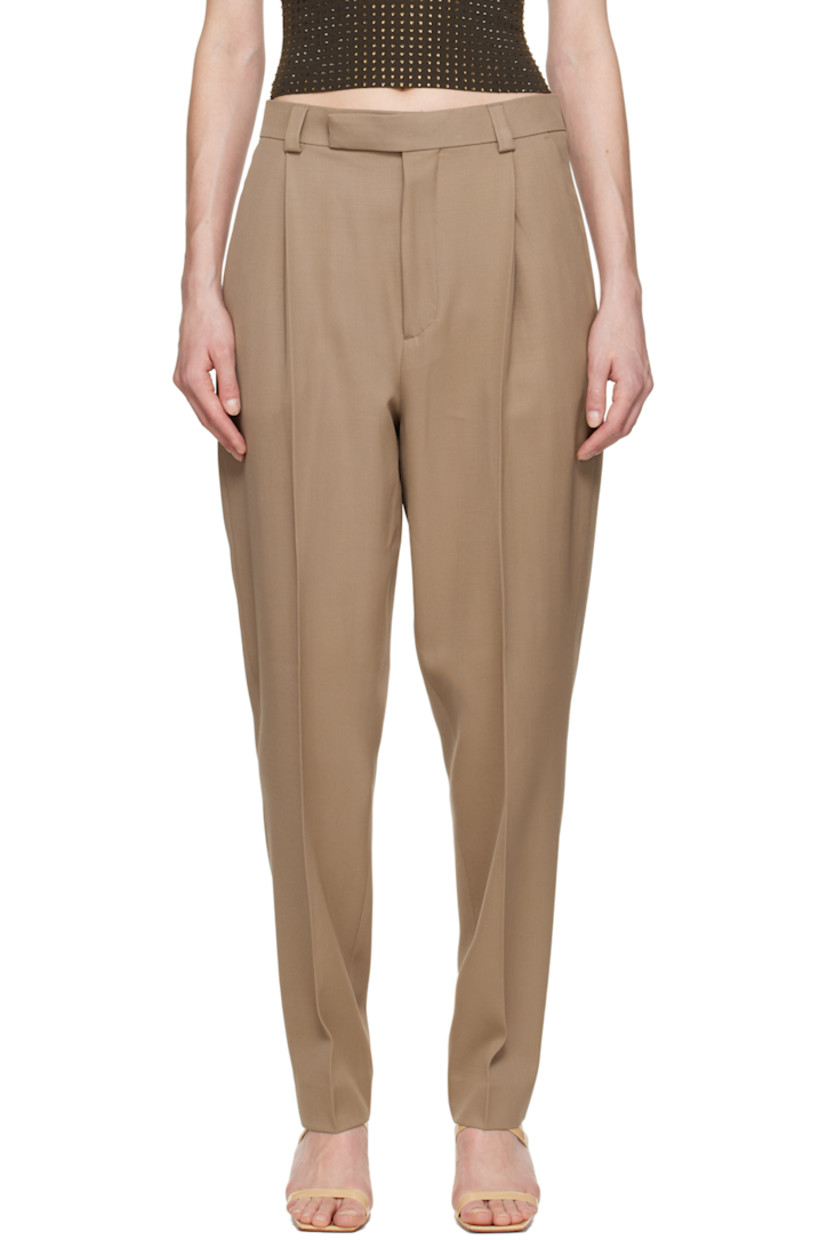 Wool gabardine trousers.

· High-rise
· Belt loops
· Three-pocket styling
· Zip-fly
· Twin pleats at front and back

Available exclusively at SSENSE.

Supplier color: Beige