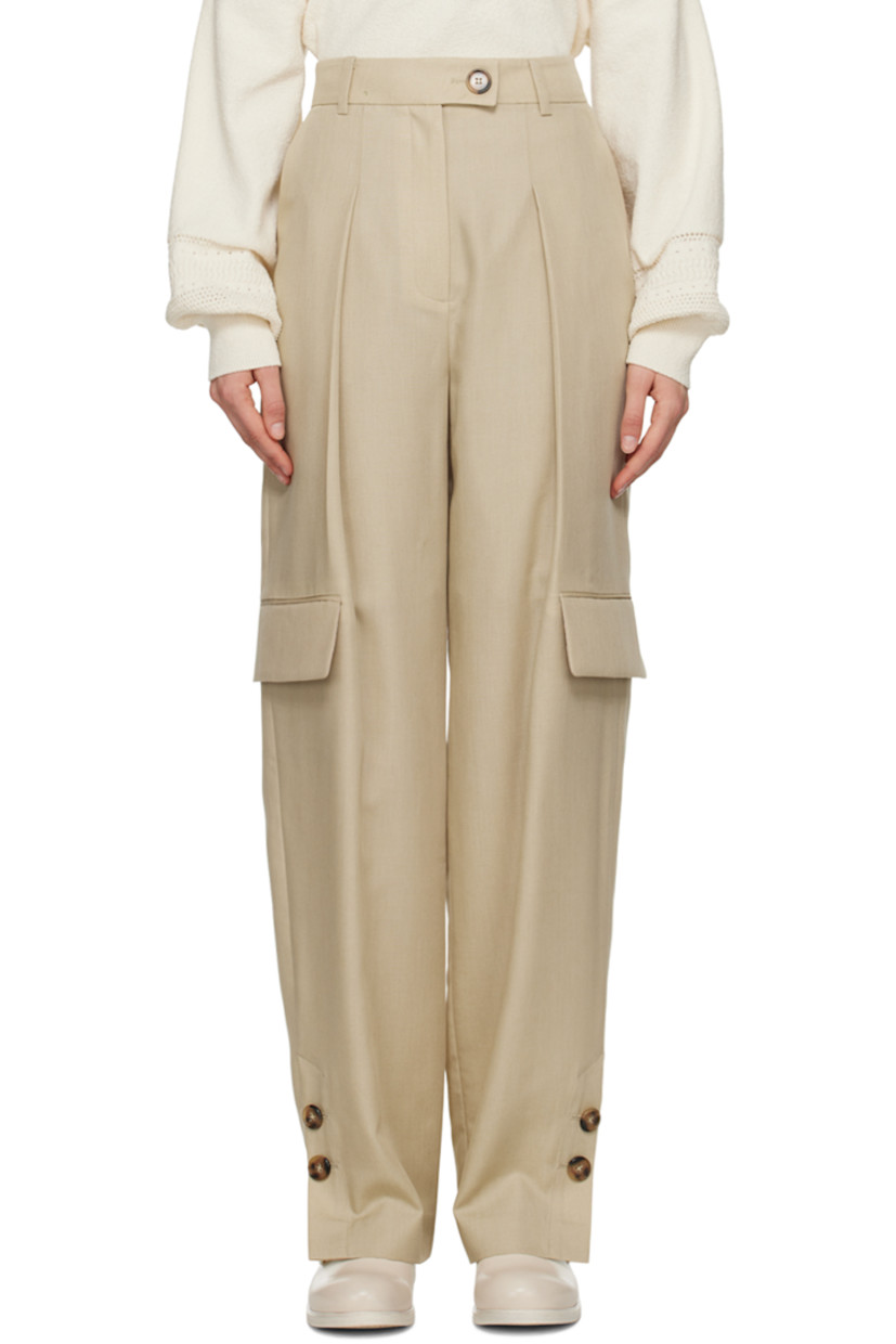 Tencel and wool-blend broadcloth trousers.

· Belt loops 
· Four-pocket styling
· Zip-fly
· Pleats at front 
· Buttoned vent at cuffs
· Flap pocket at outseams 
· Partial satin lining

Supplier color: Beige