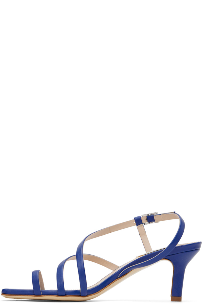 Buffed lambskin heeled sandals in blue.

· Open square toe
· Straps at vamp
· Adjustable pin-buckle slingback strap
· Logo patch at padded leather footbed
· Covered kitten heel with rubber injection
· Leather sole
· Heel: H2.5 in

Supplier color: Blue