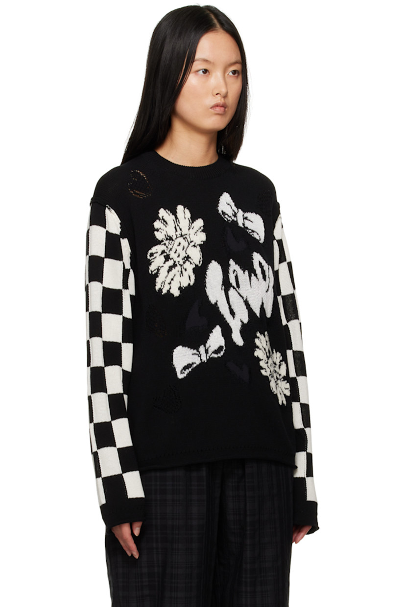 Knit cotton-blend sweater. Jacquard graphic throughout.

· Rib knit crewneck
· Rolled edge at hem and cuffs
· Jacquard check pattern at sleeves

Supplier color: Black