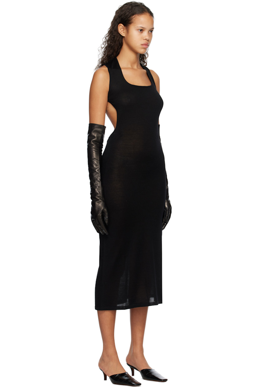 Semi-sheer knit acrylic- and merino wool-blend dress.

· Scoop neck
· Fixed shoulder straps
· Low back
· Unlined

Supplier color: Black