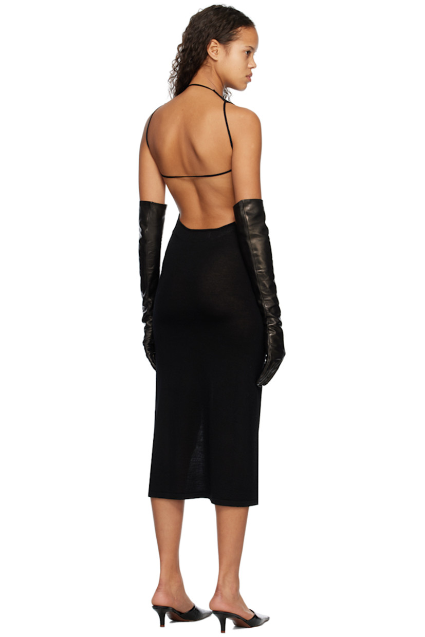 Semi-sheer knit acrylic- and merino wool-blend dress.

· Scoop neck
· Fixed shoulder straps
· Low back
· Unlined

Supplier color: Black