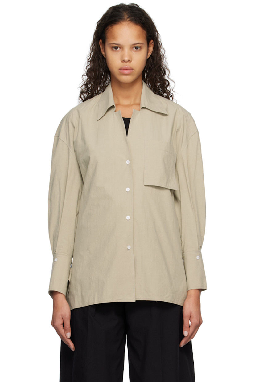 Crinkled cotton poplin shirt. 

· Spread collar
· Button closure
· Patch pocket
· Vented side seams
· Detachable panel at two-button barrel cuffs
· Twin knife pleats at back yoke
· Mother-of-pearl hardware

Supplier color: Sand