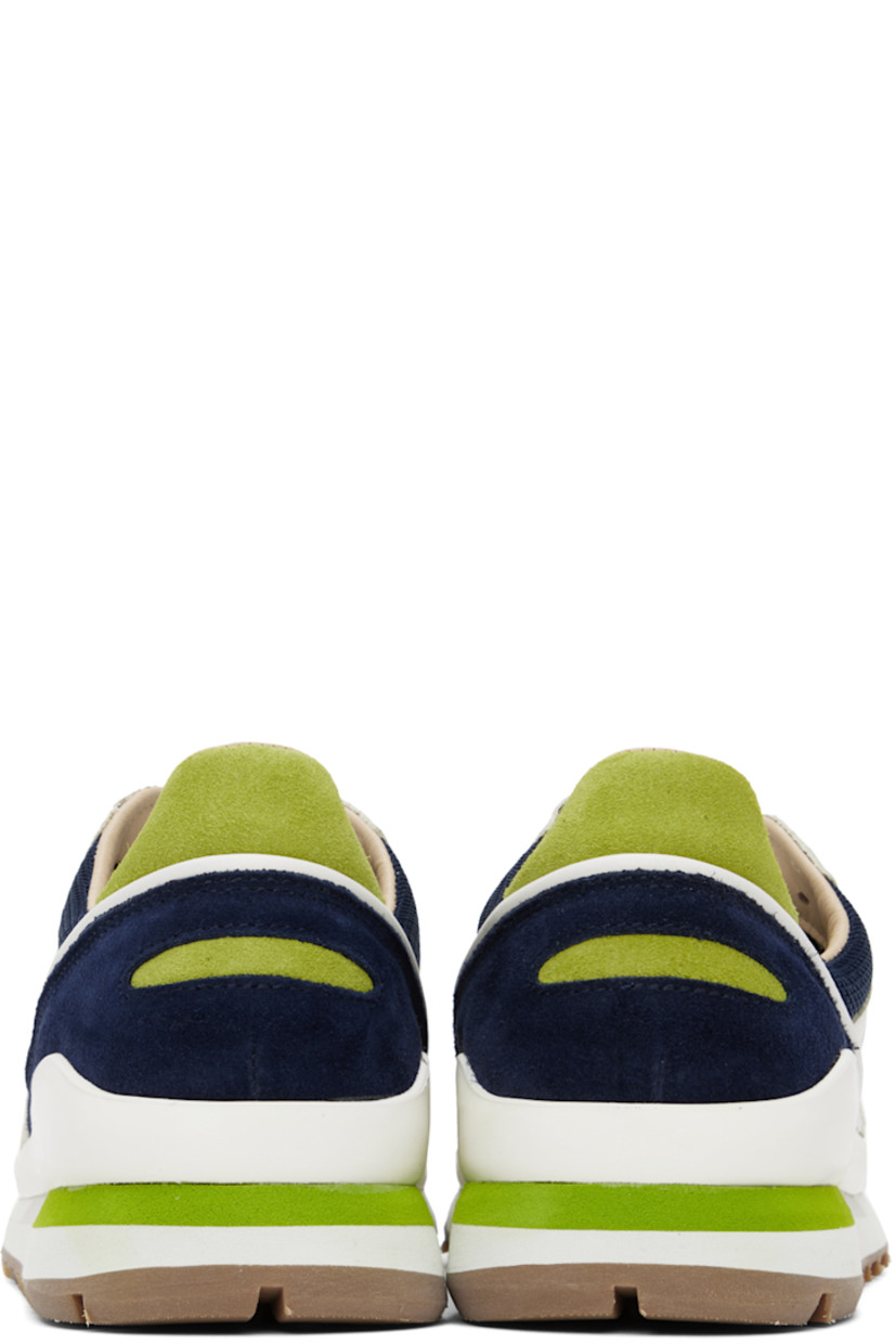 Low-top paneled canvas, nappa leather, and suede sneakers in multicolor. 

· Lace-up closure
· Padded tongue and collar
· Rubberized trim at welt
· Mesh and buffed calfskin lining 
· Foam rubber midsole
· Treaded rubber outsole

Supplier color: Sand