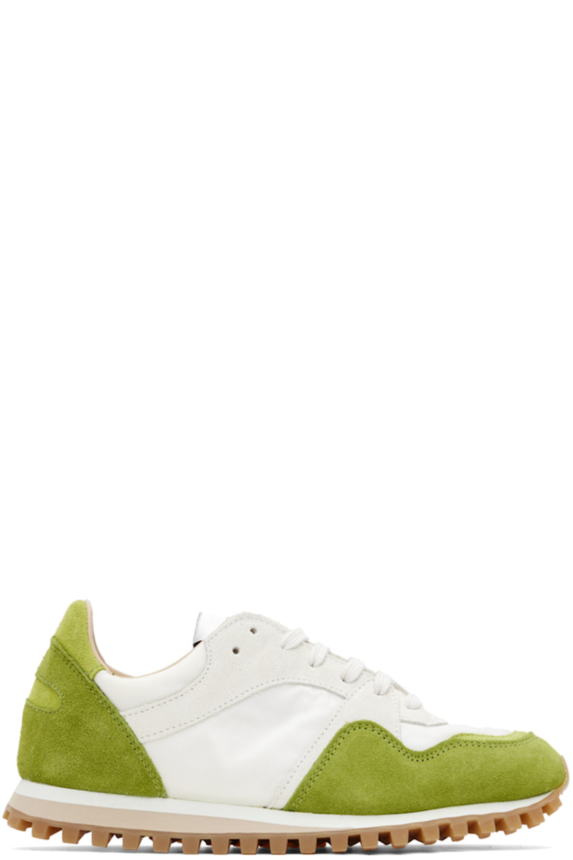 Low-top paneled canvas and suede sneakers colorblocked in white and tones of green.

· Lace-up closure
· Logo patch at tongue
· Buffed calfskin and mesh lining
· Foam rubber midsole 
· Treaded rubber outsole

Supplier color: Green