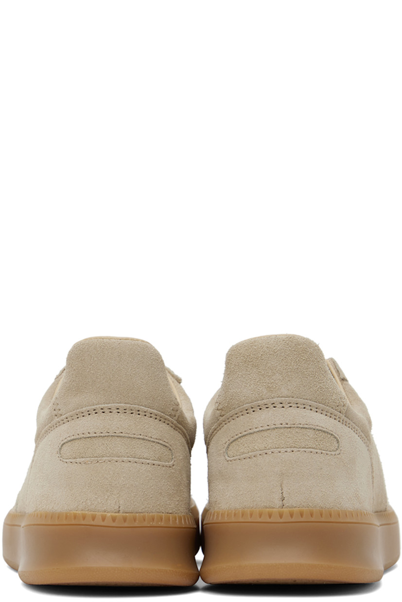 Low-top paneled suede sneakers in beige.

· Lace-up closure
· Padded tongue and collar
· Perforated detailing at inner side
· Buffed calfskin and mesh lining 
· Treaded rubber sole

Supplier color: Sand