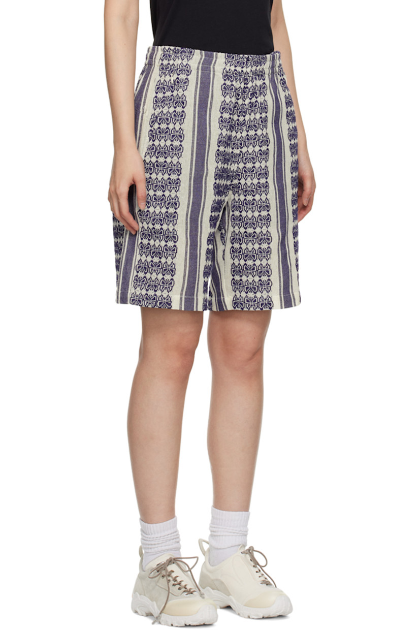 Cotton gobelin shorts. Metallic thread detailing and jacquard graphic pattern throughout.

· Concealed drawstring at elasticized hem
· Four-pocket styling
· Unlined

Supplier color: White