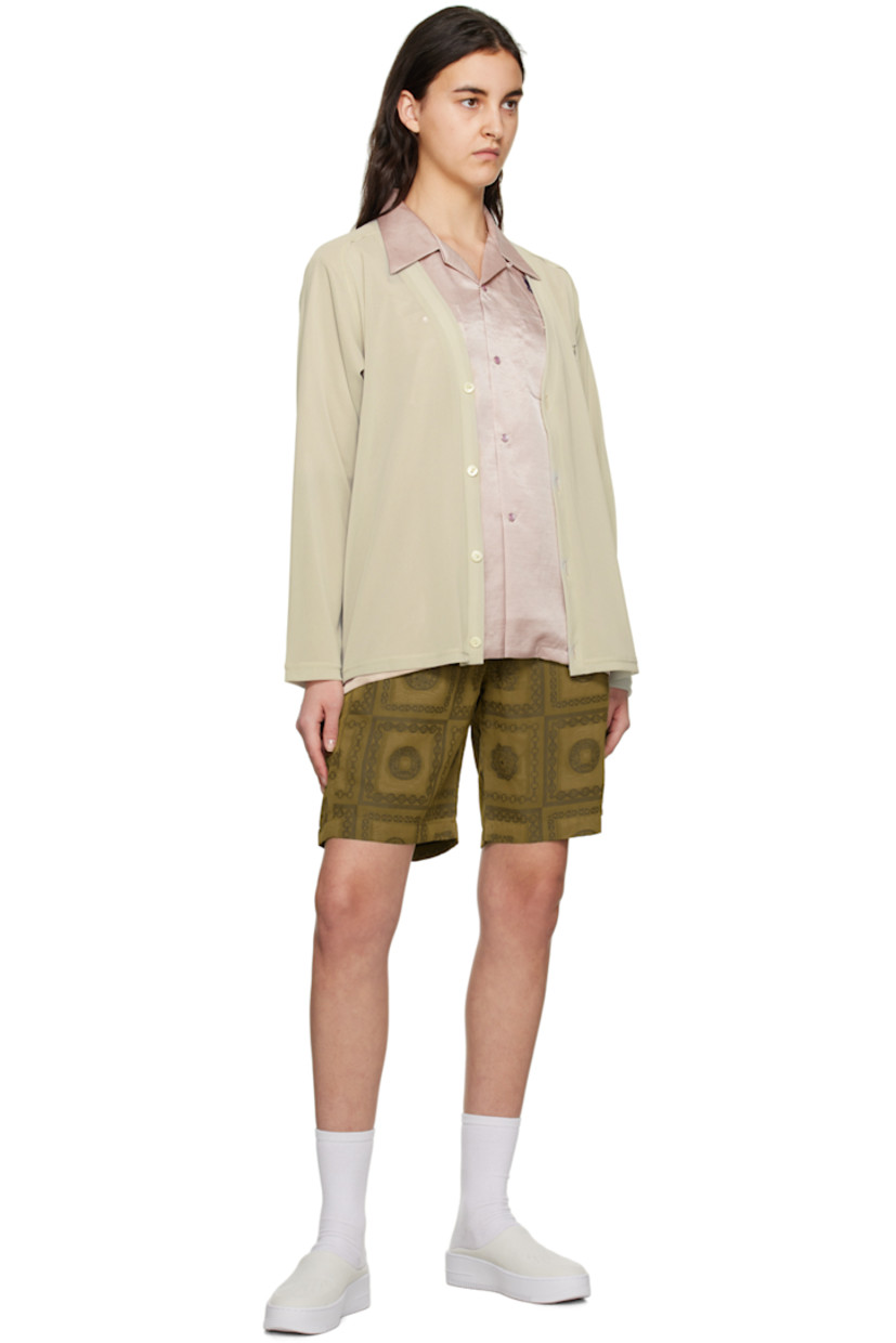 Plain-woven polyester-blend shorts. Jacquard graphic pattern throughout.

· Concealed drawstring at elasticized waistband
· Four-pocket styling
· Full cupro satin lining

Supplier color: Olive