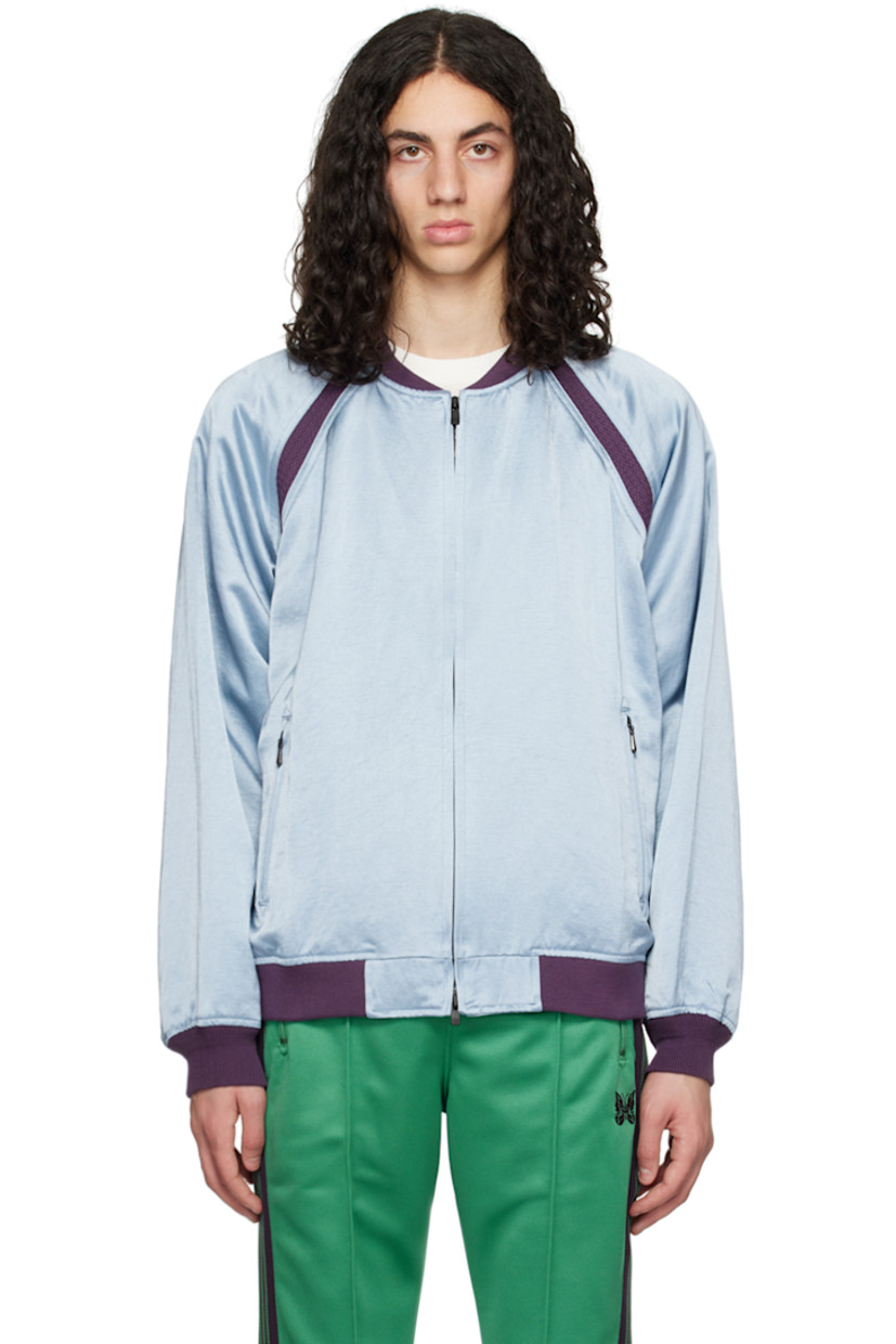 Triacetate- and linen-blend sateen bomber jacket.

· Rib knit stand collar, hem, and cuffs
· Zip closure
· Zip pockets
· Raglan sleeves
· Satin lining

Supplier color: Blue