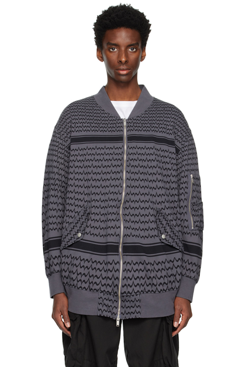 French terry bomber jacket. Graphic pattern printed throughout.

· Rib knit stand collar, hem and cuffs
· Two-way zip closure
· Flap pockets
· Dropped shoulders
· Utility pocket at sleeve
· Logo-engraved silver-tone hardware
· Unlined

Supplier color: Char base