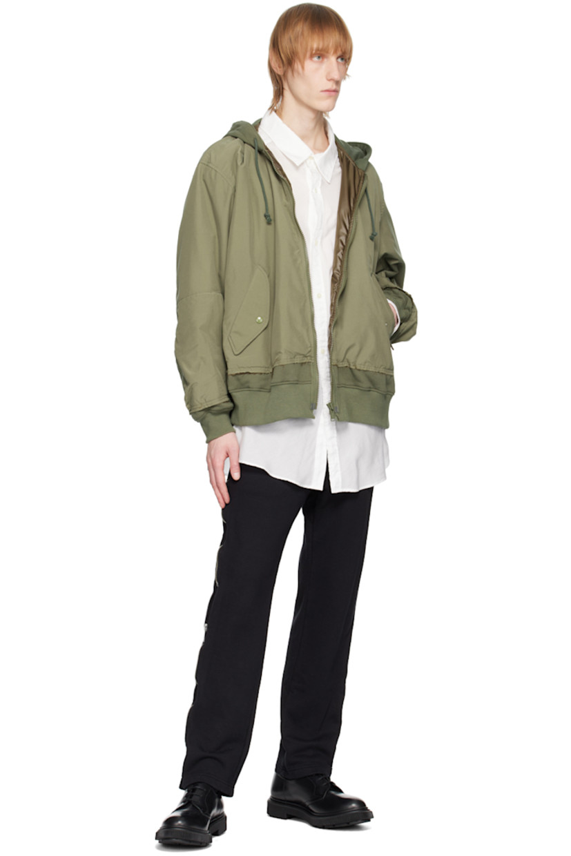 French terry trousers.

· D-ring at belt loops
· Concealed drawstring at elasticized waistband
· Four-pocket styling
· Zip accents at outseams 
· Logo patch at back 

Supplier color: Black