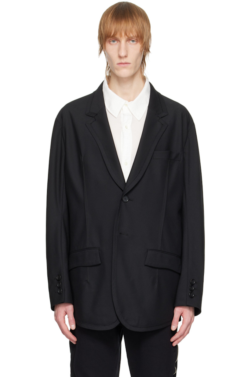 Wool-blend twill blazer. 

· Notched lapel
· Two-button closure
· Flap pockets
· Exposed darts at front
· Padded shoulders
· Three-button surgeon's cuffs 
· Partial cupro satin lining

Supplier color: Black