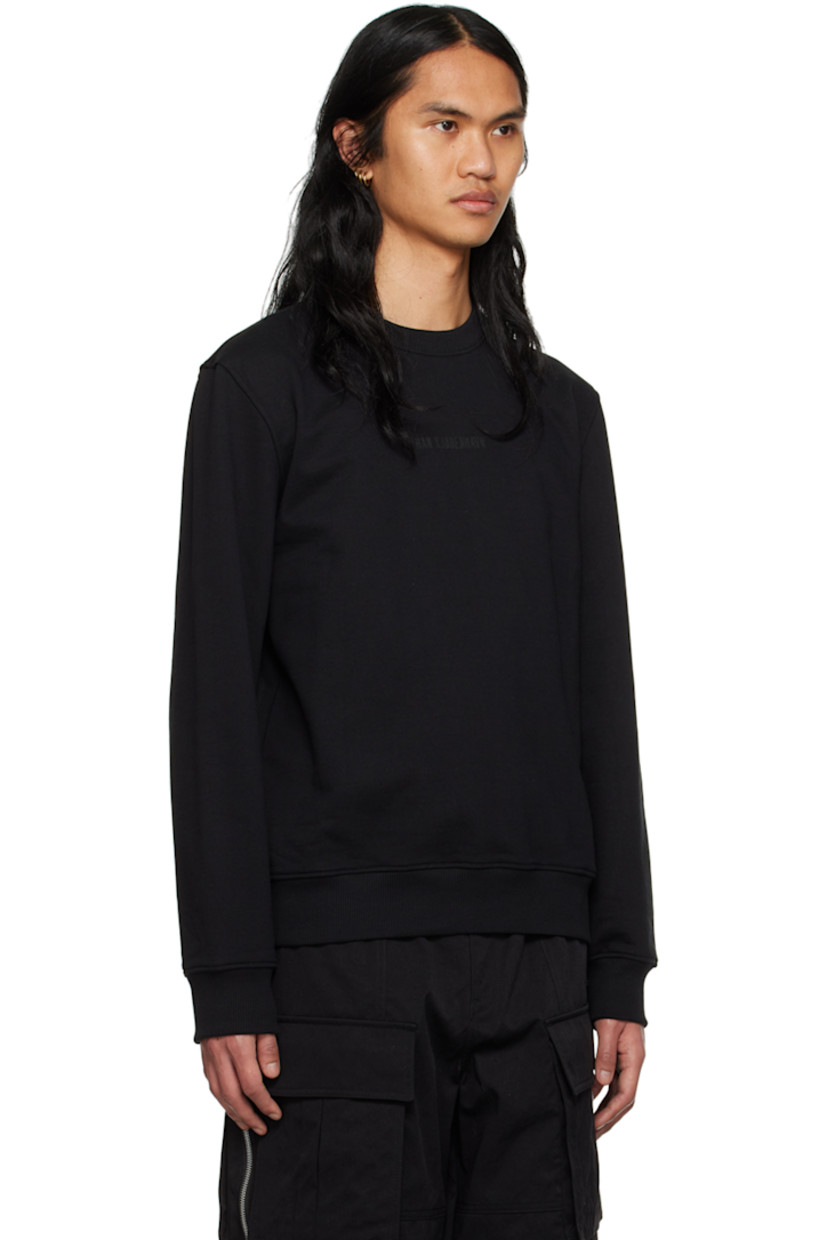 Organic cotton French terry sweatshirt. 

· Rib knit crewneck, hem, and cuffs
· Logo bonded at front

Available exclusively at SSENSE. 

Supplier color: Black