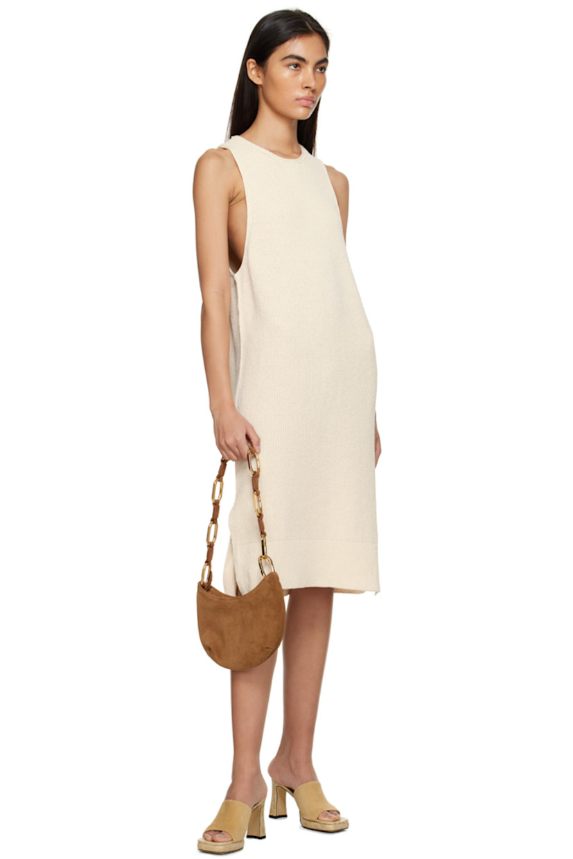 Rib knit organic cotton- and recycled nylon-blend dress. 

· Rolled edge at crewneck and armscyes 
· Vented side seams 

Supplier color: Creme